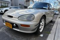 Suzuki Cappuccino kei roadster front three-quarter view, Wikimedia Commons photo